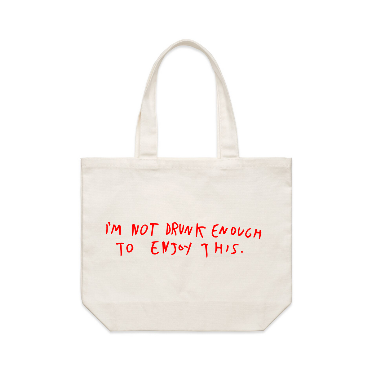 Cream shoulder tote with Drunk Xmas Tote graphic by Lonely Kids Club
