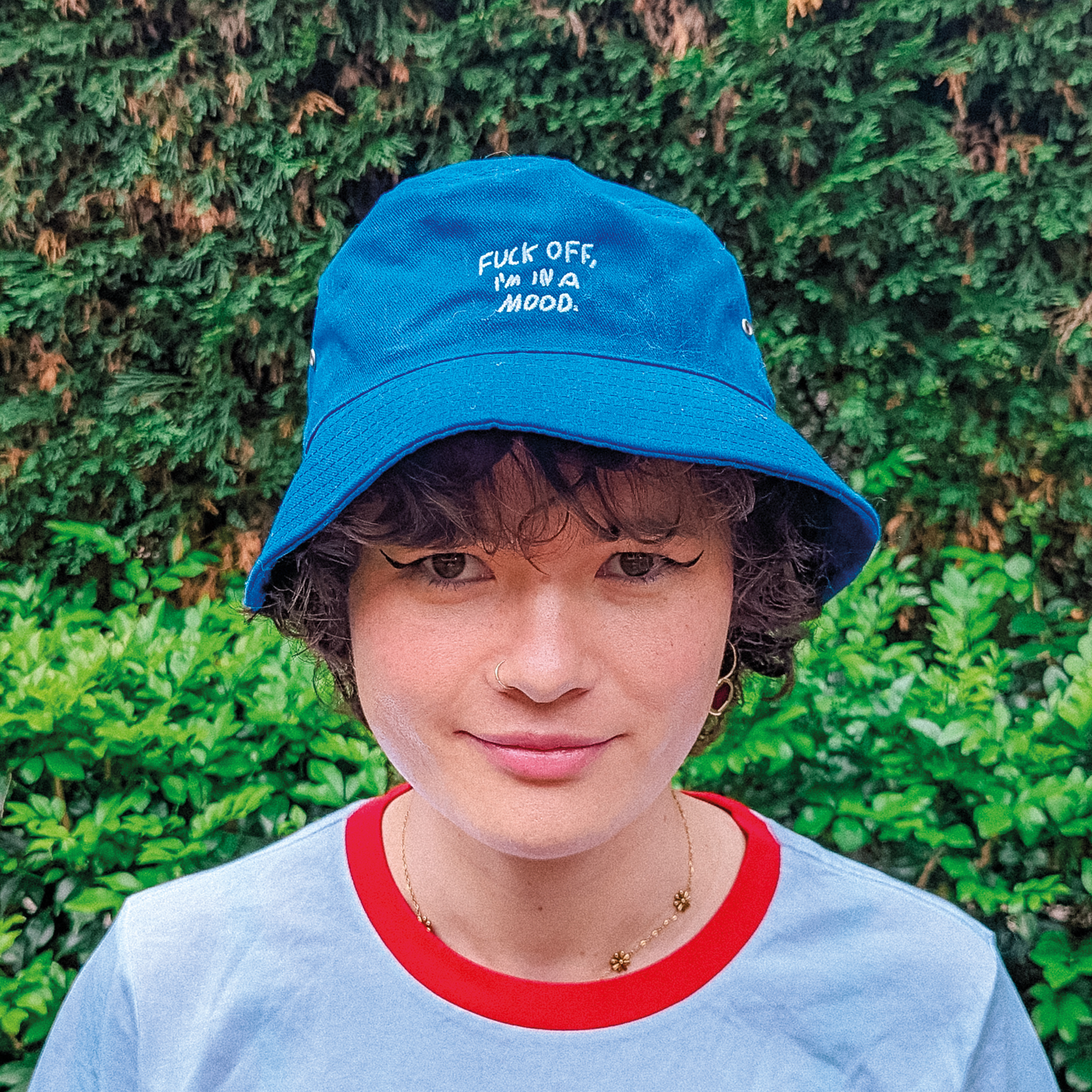 Royal Blue bucket hat with Fuck Off Bucket Hat graphic by Lonely Kids Club