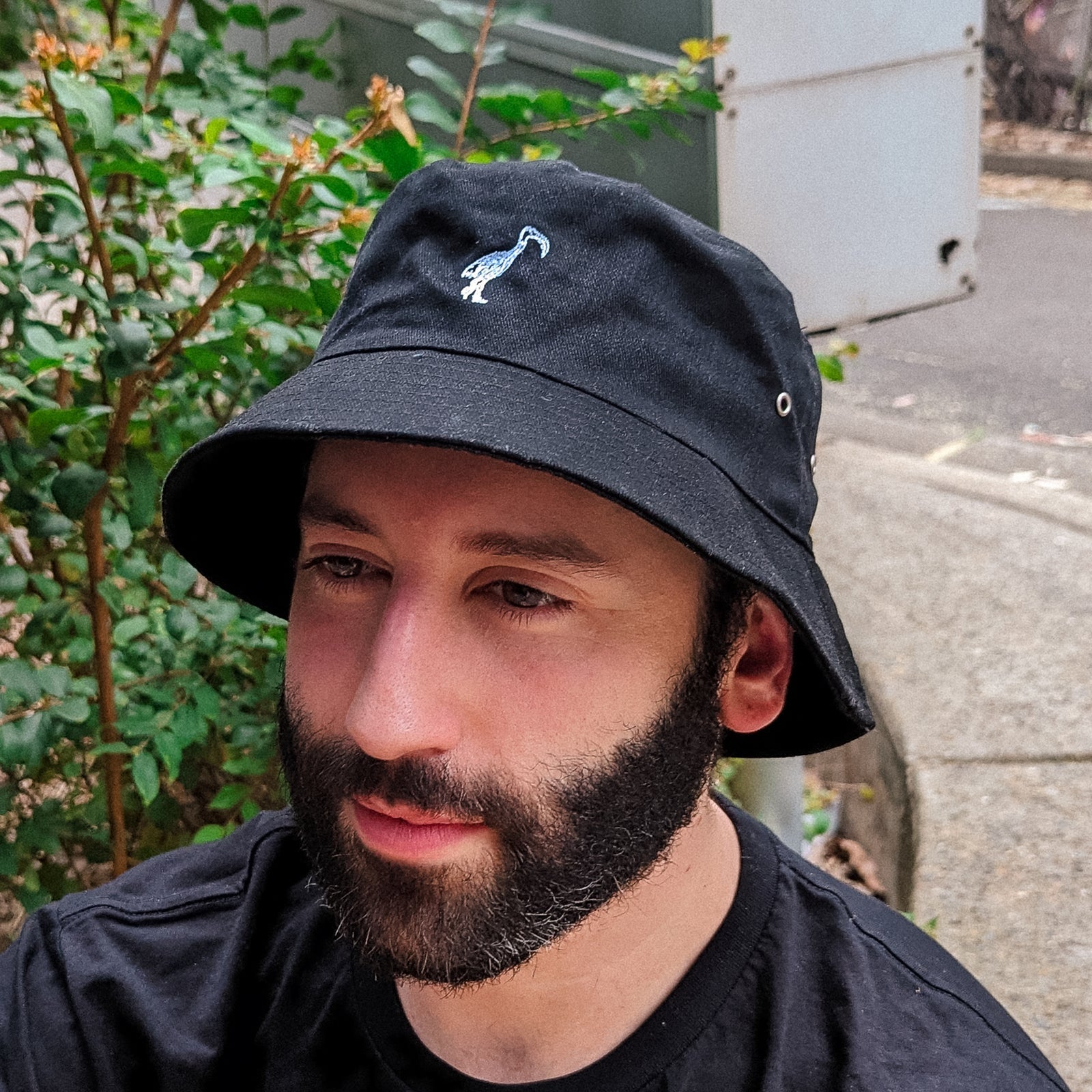 Black bucket hat with Ibis Logo Bucket Hat graphic by Lonely Kids Club