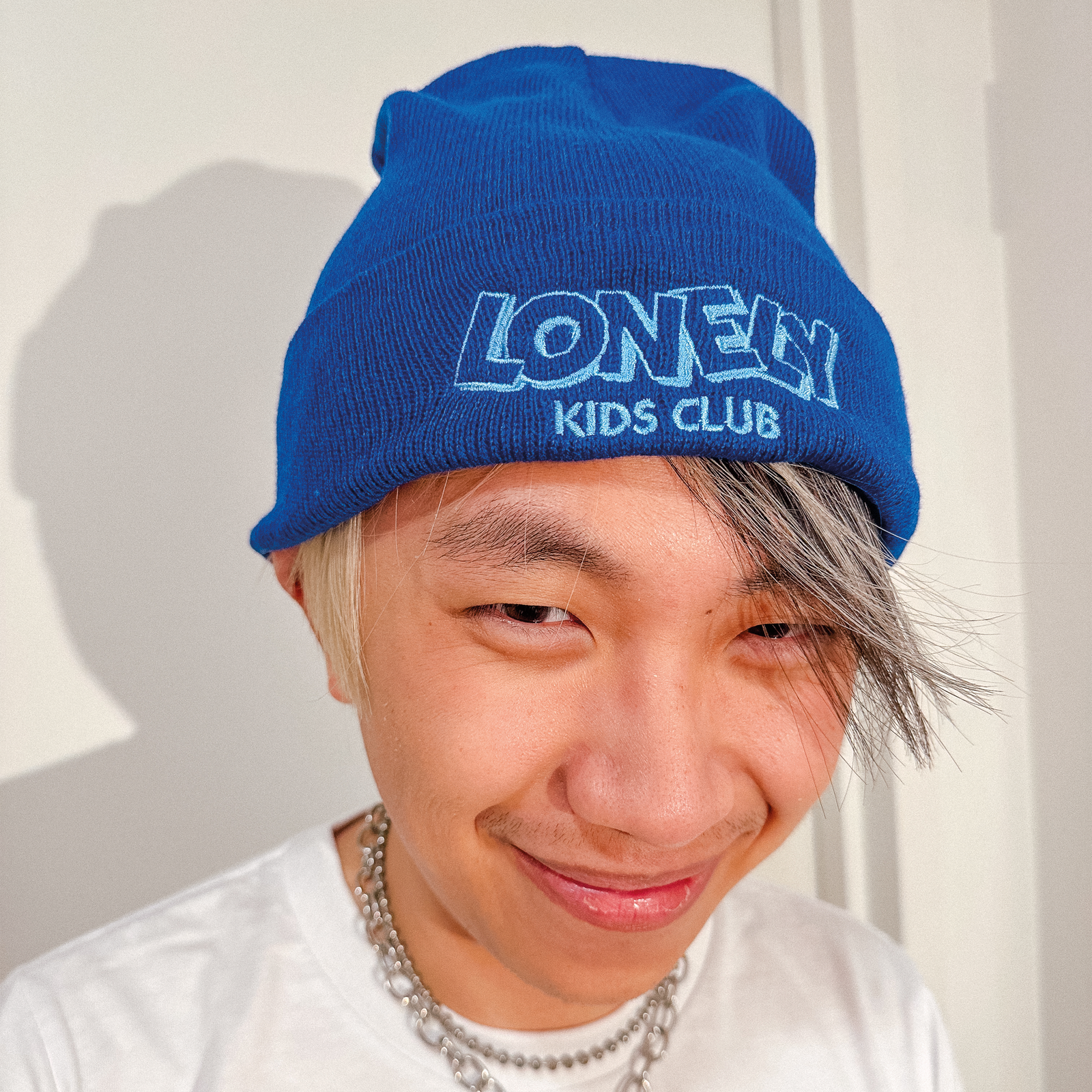 Royal Blue beanie with LKC Logo Beanie graphic by Lonely Kids Club