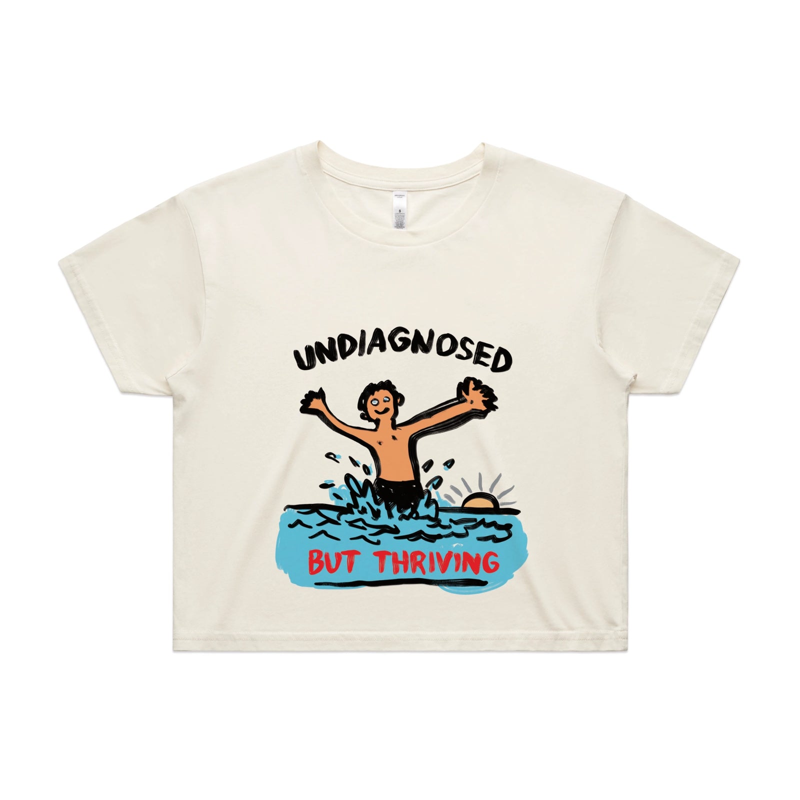 Ecru crop top with Undiagnosed But Thriving graphic by Lonely Kids Club