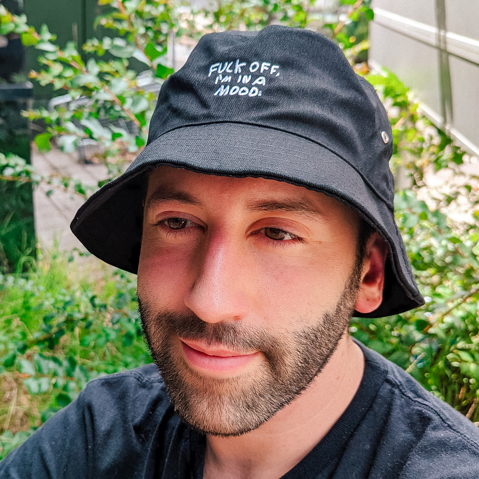 Black bucket hat with Fuck Off Bucket Hat graphic by Lonely Kids Club