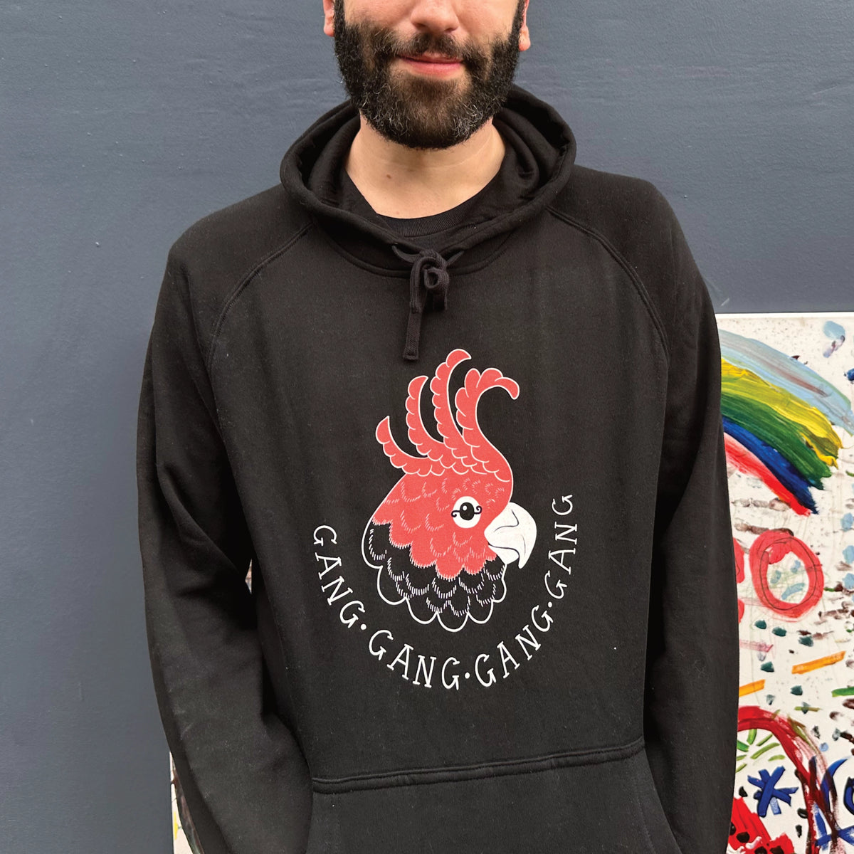 Black regular hoodie with Gang Gang Gang Gang Hoodie graphic by Lonely Kids Club