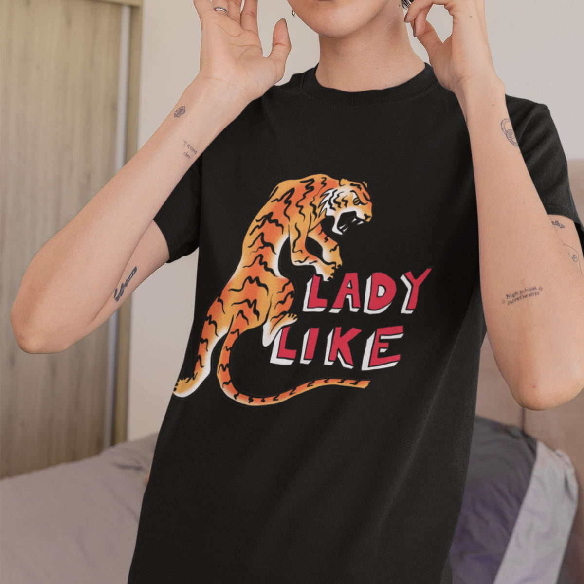 Black unisex t-shirt with Lady Like graphic by Lonely Kids Club