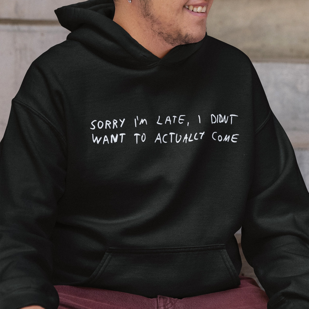 Black oversized hoodie with Sorry I'm Late Hoodie graphic by Lonely Kids Club