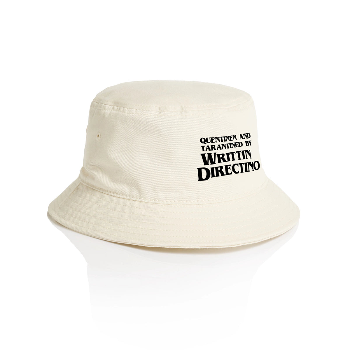 Ecru bucket hat with Writtin Directino Hat graphic by Lonely Kids Club