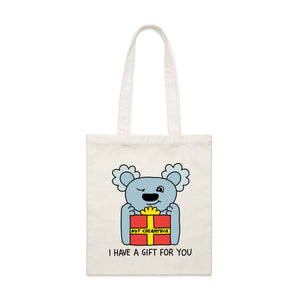 I Have A Gift For You tote bag with a koala holding a present