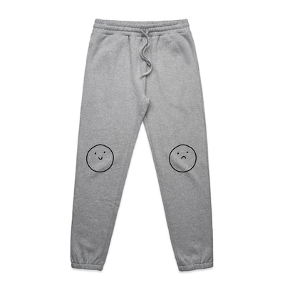 Happy Sad Track Pants by Lonely Kids Club. All clothing from our T-shirts to our shorts and hoodies are ethically made, and printed packed and shipped from Sydney.