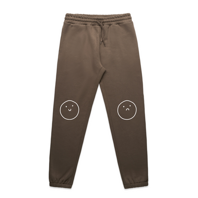 Happy Sad Track Pants by Lonely Kids Club. All clothing from our T-shirts to our shorts and hoodies are ethically made, and printed packed and shipped from Sydney.