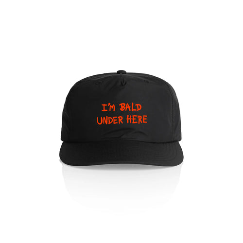 I'm Bald Under Here Cap by Lonely Kids Club. All clothing from our T-shirts to our shorts and hoodies are ethically made, and printed packed and shipped from Sydney.