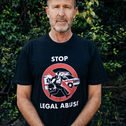 Stop Legal Abuse Tee by Lonely Kids Club. All clothing from our T-shirts to our shorts and hoodies are ethically made, and printed packed and shipped from Sydney.