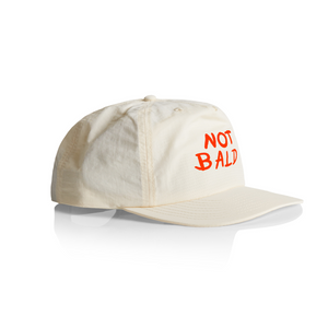 Not Bald Cap by Lonely Kids Club. All clothing from our T-shirts to our shorts and hoodies are ethically made, and printed packed and shipped from Sydney.