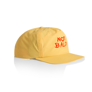 Not Bald Cap by Lonely Kids Club. All clothing from our T-shirts to our shorts and hoodies are ethically made, and printed packed and shipped from Sydney.