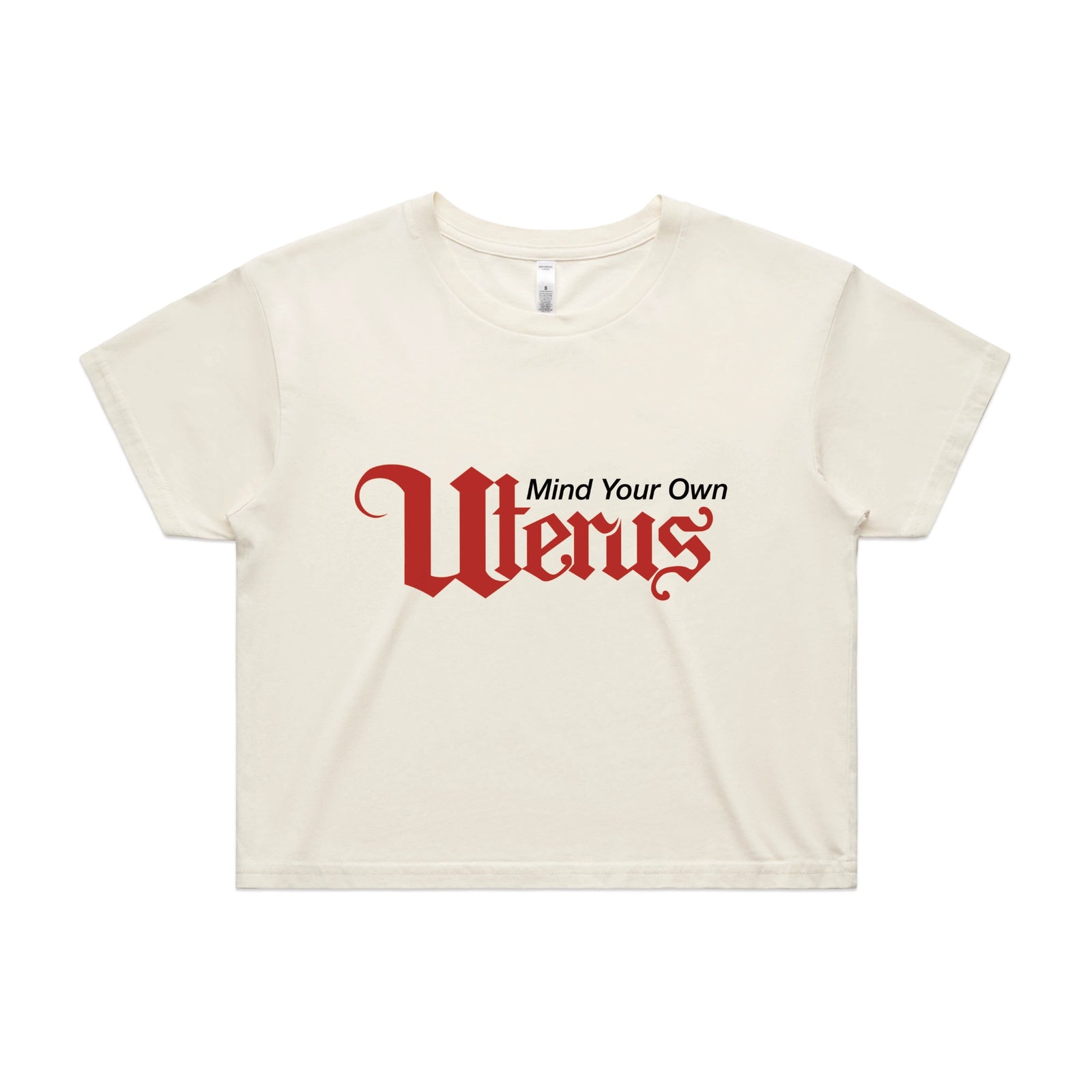 Ecru crop top with Mind Your Own Uterus graphic by Lonely Kids Club