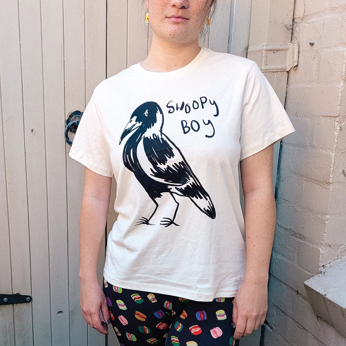 Ecru fitted womens t-shirt with Swoopy Boy graphic by Lonely Kids Club