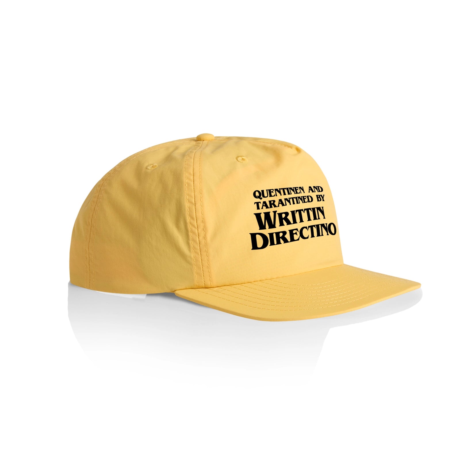 Yellow active cap with Writtin Directino Hat graphic by Lonely Kids Club